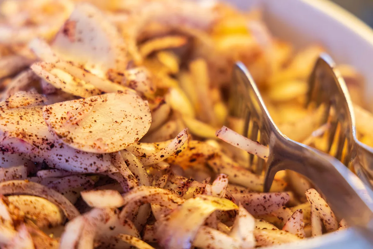 food residue trapped in tong hinge